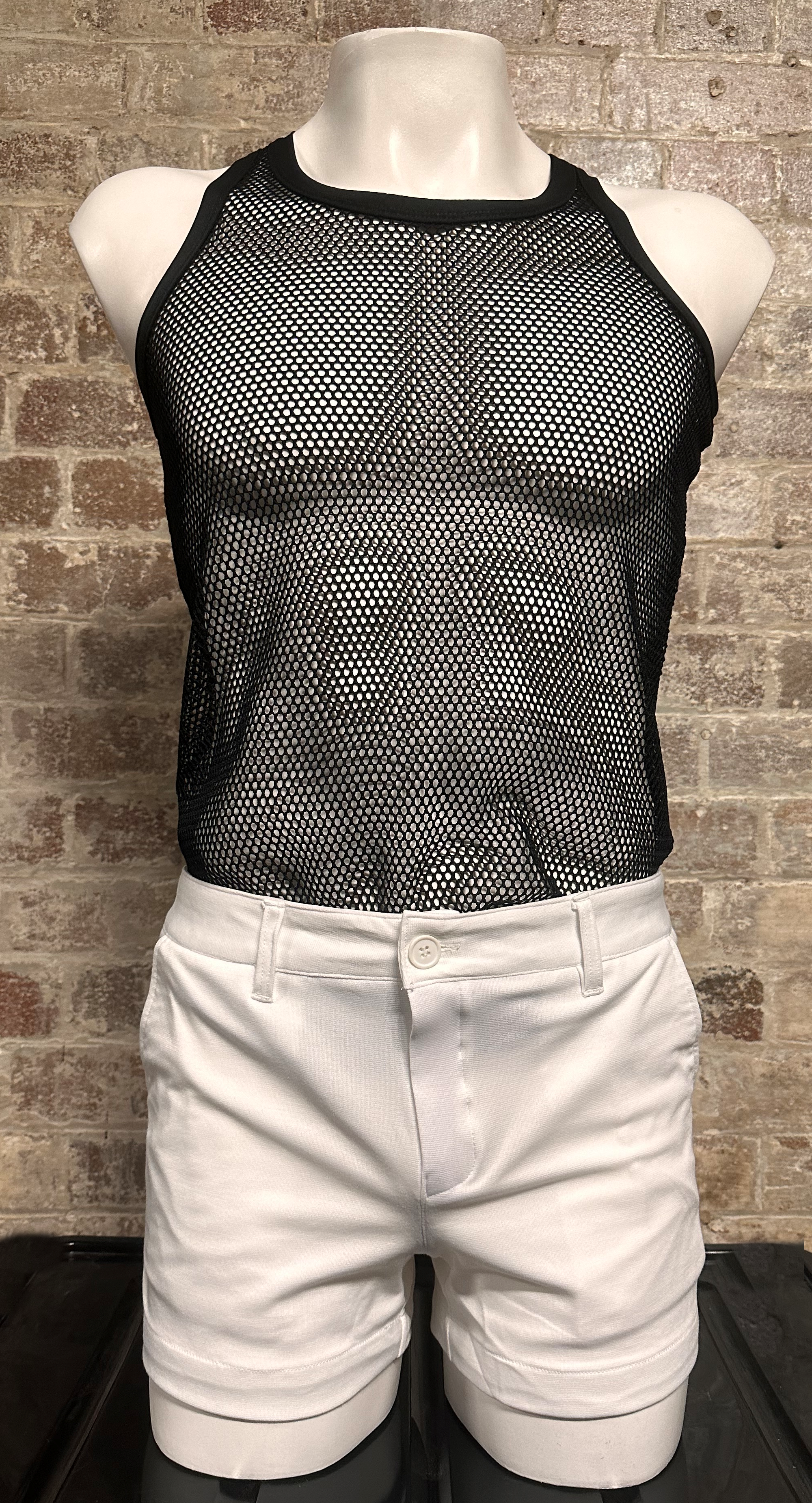A mannequin torso wearing Christopher Daniels slim fit stretch shorts in white color